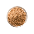 Brown powder in a clear glass container on a white background