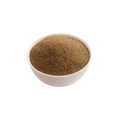 White bowl filled with brown powder on a white background