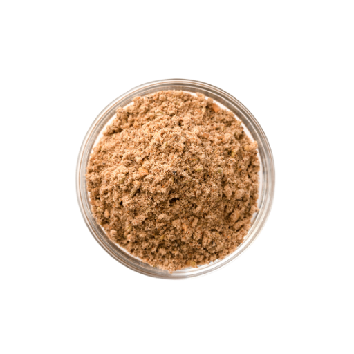 Brown powder in a clear glass container on a white background