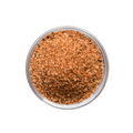 Clear container filled with a brown spice mix on a white background